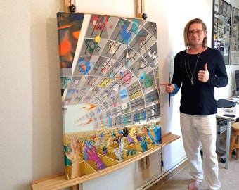 May include: A large, colorful abstract painting with a complex design, mounted on a wooden frame. The artwork features a variety of shapes and colors, including orange, blue, and yellow. The artist's name, von bLOCKi, is visible in the upper right corner.