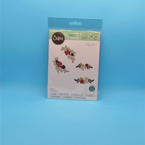 Pode incluir: Um pacote de matrizes de corte Sizzix Thinlits com designs florais de Lisa Jones. O pacote inclui 10 matrizes, 10 matrizes, 10 troqueles, 10 fustelle, 10 вырубки, 10 stanzen e 10 cortantes.