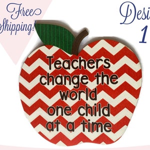 May include: Red and white chevron patterned wooden apple with the text "Teachers change the world one child at a time".