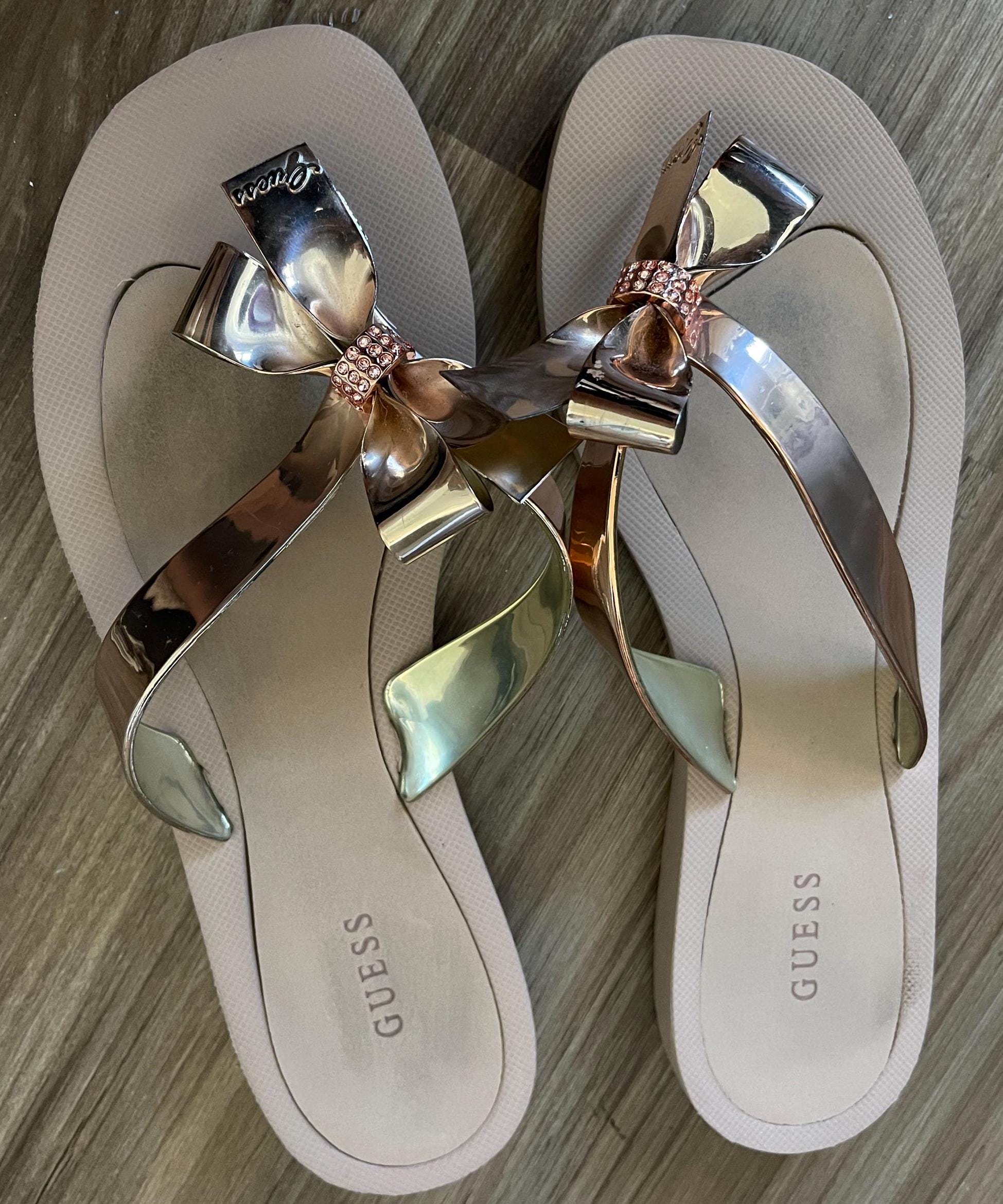 guess rose gold flip flops