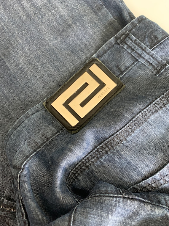 Jean versace homme sale