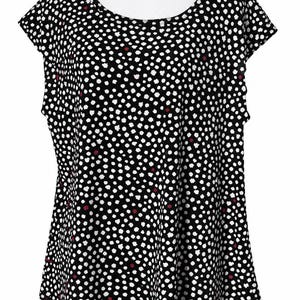 May include: A black short-sleeved top featuring a repeating pattern of small white dots and scattered red dots. The garment has a rounded neckline and a relaxed fit, with a straight hemline that falls below the waist, providing a simple silhouette.
