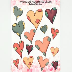 May include: A sticker sheet titled Mended Hearts Stickers by Stick With Sue featuring various heart-shaped illustrations in shades of peach, red, green, and brown. Each heart displays stitched details, patches, and visible seams on a white background.