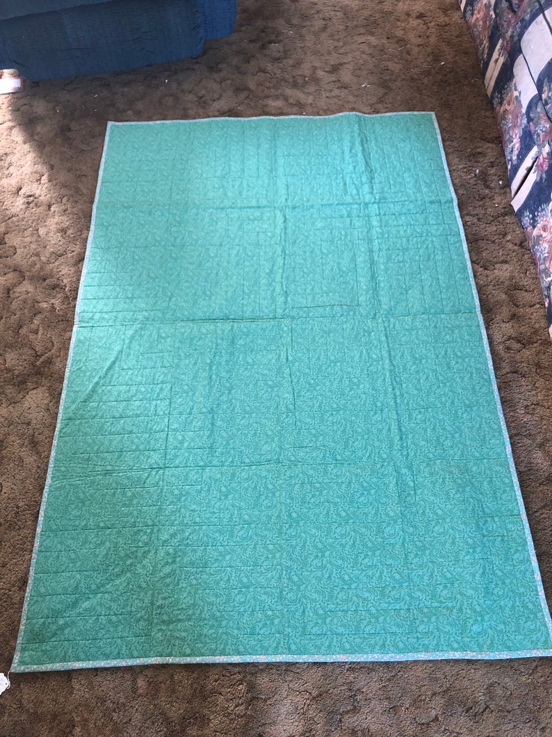 Kaleidoscope lap quilt