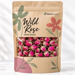 May include: A stand-up kraft paper pouch containing dried wild rose buds, visible through a clear rectangular window. The packaging features the text Wild Rose DRIED BUDS and lotusfactory, decorated with illustrations of a green and a red flower.