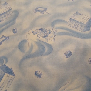 May include: Light blue fabric with a repeating pattern of a child in bed, toy wagons, barrels, and small houses. The illustrations are in a darker blue, creating a whimsical, dreamlike design. This fabric is suitable for children's items.