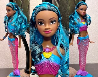 Uma barbie doll new arrivals