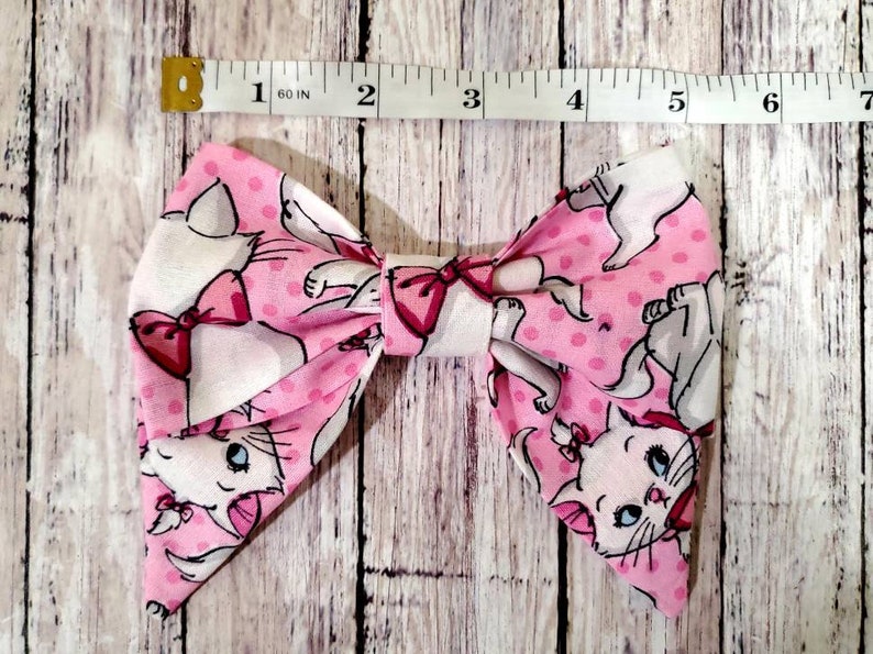 Disney Inspired Marie Bow Disney Inspired Bow ***PATTERN WILL VARY*** Hair Bow Aristocats Bow Hair Clip