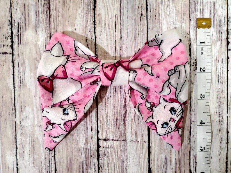 Disney Inspired Marie Bow Disney Inspired Bow ***PATTERN WILL VARY*** Hair Bow Aristocats Bow Hair Clip