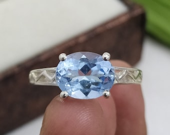 Anello ovale in argento sterling con topazio blu: gioiello per anniversario, pietra portafortuna di dicembre