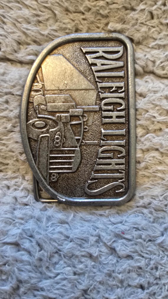 Vintage Raleigh Lights Truck Advertisement Belt Buckle View 2