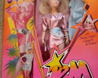 Seltene 1985 Jem/Jerrica Puppe von Jem. Der Kunststoff auf der Vorderseite war etwas vergilbt