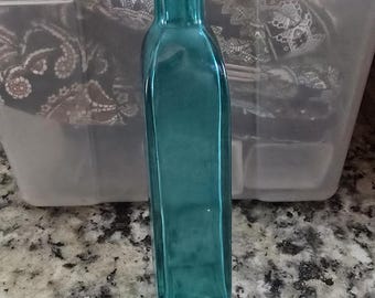7 in vintage blauwe glazen fles/vaas