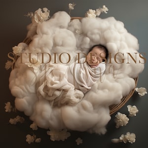 May include: A newborn baby is sleeping peacefully in a basket filled with white fluffy clouds. The baby is wrapped in a white blanket and has a light brown complexion. The basket is surrounded by white flowers.