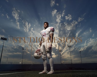 May include: A football player stands on a field, holding a helmet. He wears a white uniform with red and purple accents. The sky is filled with clouds, and the text "STUDIO DESIGNS" is overlaid on the image.