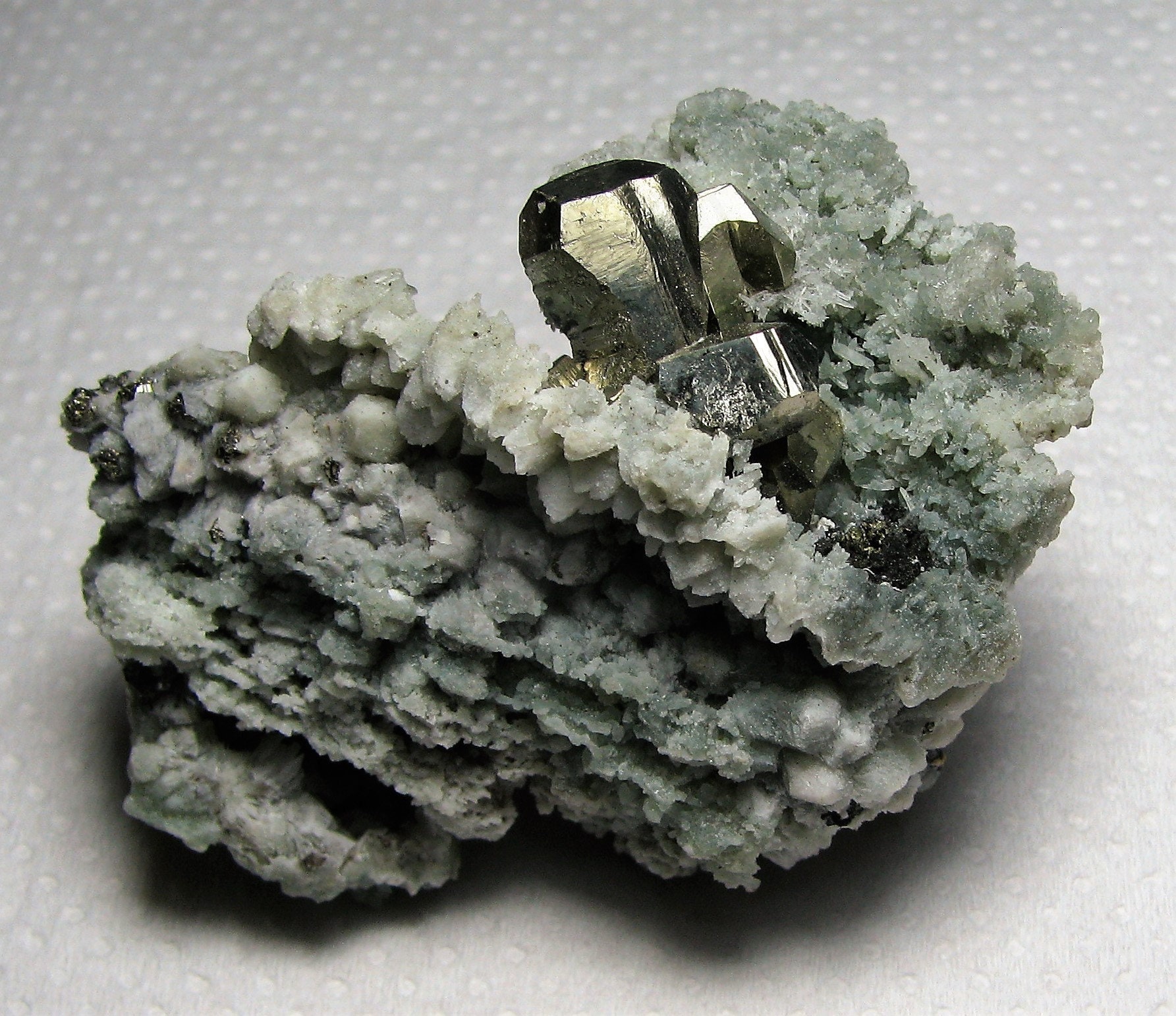 Very aesthetic shiny pyrite on green quartz with chloride includings from the famous 9th of September mine Bulgaria N2708 Madan