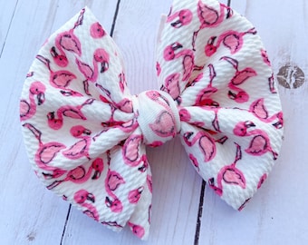 Tropical aqua blue green with pink flamingo print 4" Pin up hair bow clip Tropical aqua blue green with pink flamingo print 4" Pin up hair bow clip