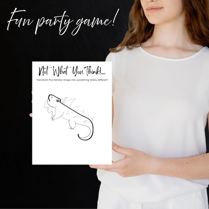 May include: A white sheet of paper with a black line drawing of a lizard, held by a person. The text "Not What You Think!" and "Fun party game!" are also visible. The game encourages creative thinking.