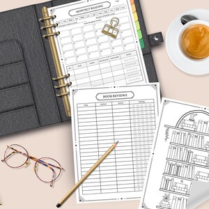May include: A black and white printable planner for tracking monthly reading goals. The planner includes a calendar, a book log, and a book review section. The planner also includes a black and white illustration of a bookshelf with books.