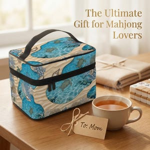 a gift for Mahjong Lovers, including a blue and white patterned bag, a cup of tea, and a card with a message addressed to "Mom".