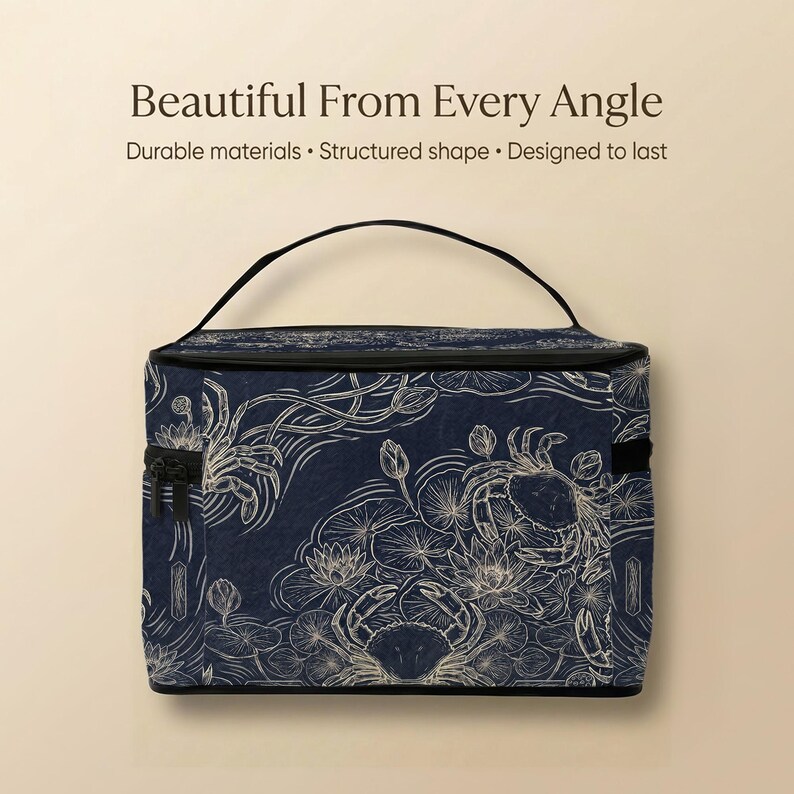 A blue and white patterned bag with a handle, placed against a beige background.