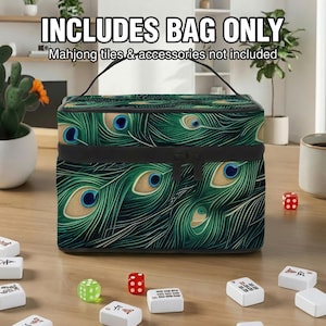 a large, colorful bag with a pattern of peacock feathers, placed on a wooden surface. There are also several playing cards and dice scattered around the bag.