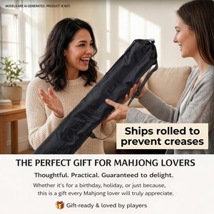 two women smiling and holding a large black bag, with text above them stating that the bag is a perfect gift for Mah Jongg lovers.