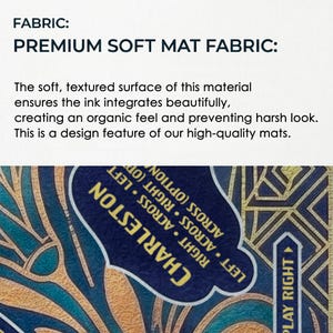 The image is a close-up of a soft, textured fabric with a pattern of blue and gold designs.
