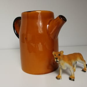 Ceramic water jug Romain Poët Laval signed, very beautiful enamelling chamois color very trendy, vintage circa 1960. Water jug