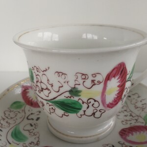 Old porcelain cup and saucer decoration Digoin deep pink liseron flowers and foliage, large cup circa early 20th