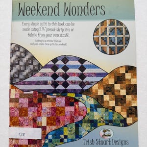 May include: A book cover titled "Weekend Wonders" featuring colorful quilt designs. The cover includes text about using precut strip kits or fabric to create quilts. The book is by Trish Stuart Designs.