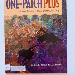 May include: A white ceramic mug with a black handle and the text "But First, Coffee" in a bold, black font. The mug is set against a neutral background, highlighting its simple design.