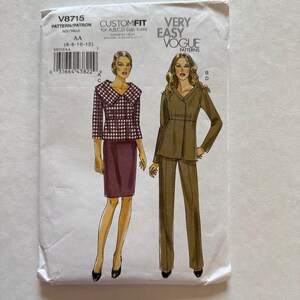 May include: Vogue pattern V8715 for women's suits. The pattern features two suit designs, one with a skirt and the other with pants. The pattern is for sizes 6-8-10-12 and includes custom fit options for A, B, C, and D cup sizes.