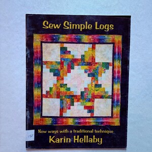 May include: A book cover titled "Sew Simple Logs" featuring a colorful quilt block design. The cover has text that reads "New ways with a traditional technique" and the author's name, Karin Hellaby.