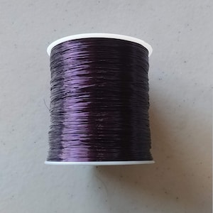 May include: A set of three ceramic mugs with a speckled, matte finish. The mugs are in shades of cream, light gray, and dark gray. Each mug has a simple, minimalist design, perfect for coffee or tea.