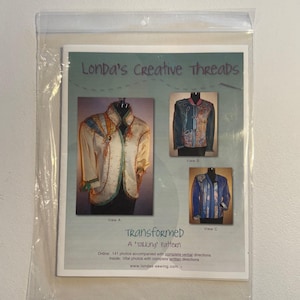 May include: A sewing pattern packet in a clear plastic sleeve. The packet features three images of a jacket, with the text "Londa's Creative Threads" and "Transformed A 'talking' pattern". The jacket designs are colorful.