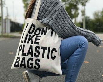 Tragetasche Baumwollbeutel Stoffbeutel Jutebeutel Totebag Bag Beutel bedrukt (2 Farben) | "I don't like plastic bags"