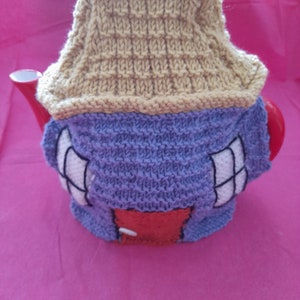 Knitted house tea cosy