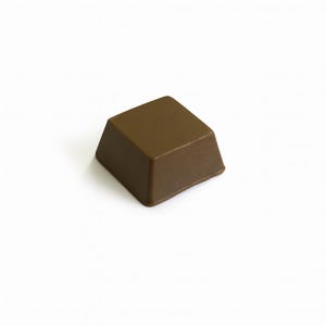 May include: A single, square-shaped piece of chocolate with a rich, brown color. The chocolate has a smooth, glossy surface and a slightly trapezoidal shape, with the top surface being smaller than the base. The edges are clean and well-defined.