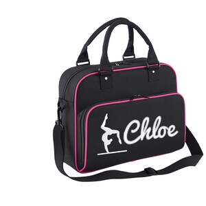 May include: Black gym bag with pink trim and a white embroidered gymnast silhouette and the name "Chloe".