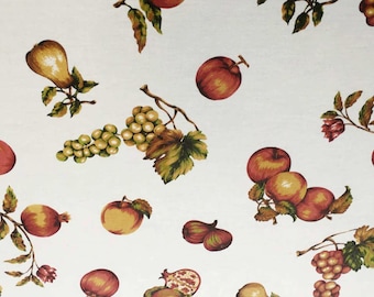 May include: A white background with a repeating pattern of various fruits and vegetables. The fruits and vegetables include pears, apples, grapes, pomegranates, and figs. The pattern is in shades of red, green, brown, and yellow.