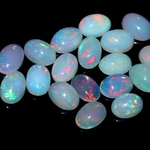 Ethiopian Opal Gemstone Lot: Multi Fire Oval Cabochons, 7x5MM opal october birthstone image 1