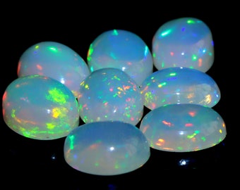 Ethiopische opaal cabochon: natuurlijke multi-vuurovale edelsteen (7 x 5 mm) opaal oktober geboortesteen