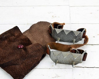 Vintage Ice Spikes: Retro Mountaineering Creepers with Leather Straps