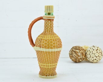 Dame-jeanne vintage en verre vert avec tresse : bouteille de vin décorative