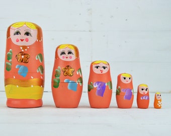 Vintage houten matroesjka-nestpoppen, handbeschilderde Russische poppen (6 in 1)