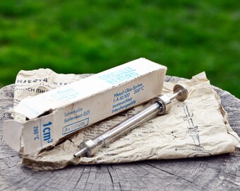 Vintage glazen spuit: dokterstool, gemaakt in de DDR, ongebruikt