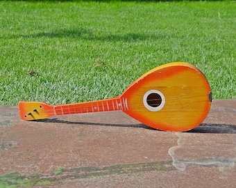 Vintage Wooden Toy Guitar: Children's Musical Instrument, Room Decor