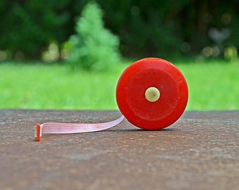 Vintage Red Sewing Measuring Tape: Retractable Dual Scale Tailor Tool