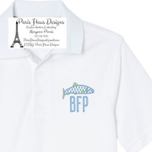 May include: White polo shirt with a blue and green embroidered fish and the letters "BFP" in blue.